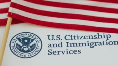 US Citizenship and Immigration Services document with American flag
